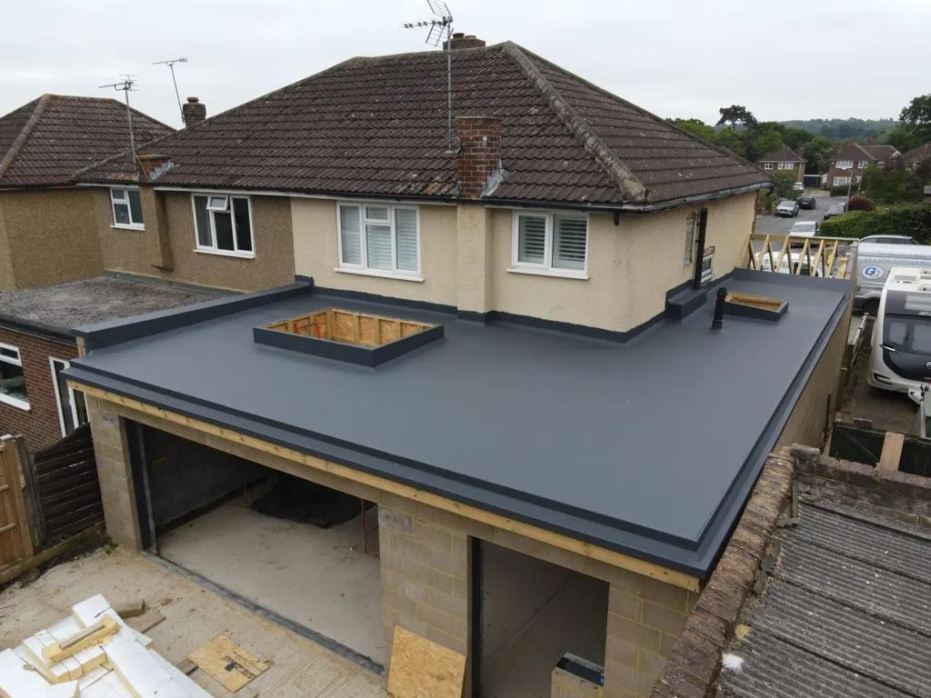 Flat roof on a house extension with a skylight